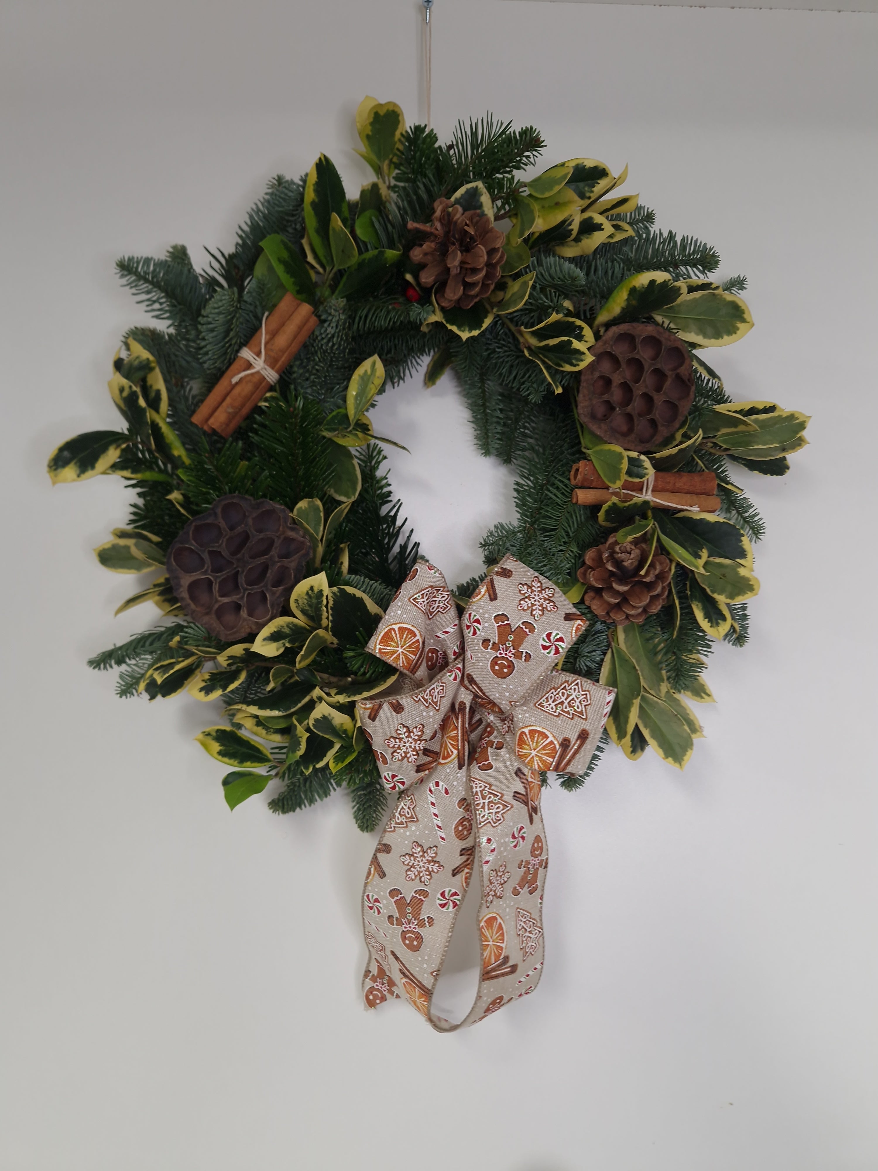 Fresh spruce and holly door wreath - Click Flowers UK | Fresh Flower Bouquet Delivery in Spalding, Lincolnshire
