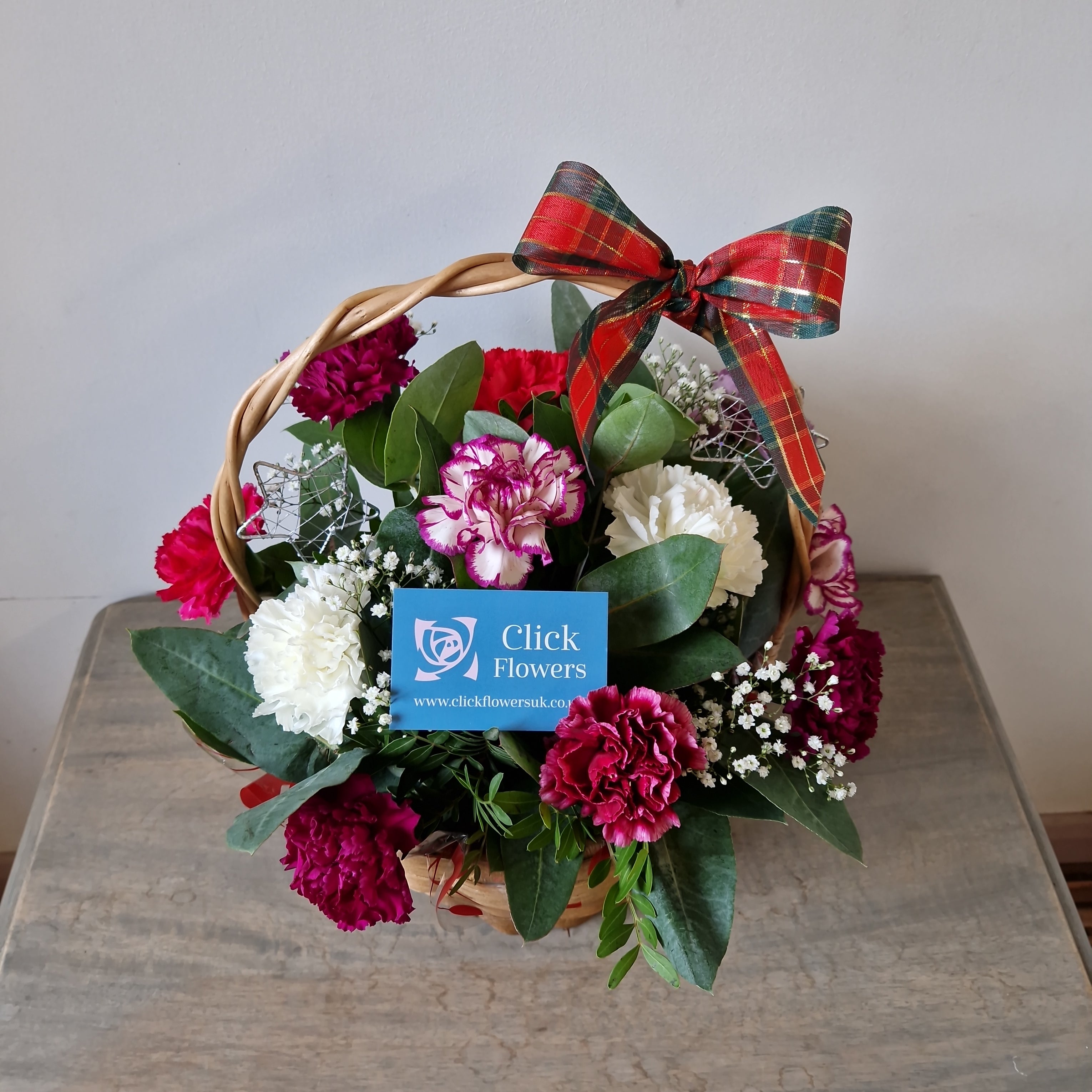 Christmas Mixed Carnation Basket Arrangement - Click Flowers UK | Fresh Flower Bouquet Delivery in Spalding, Lincolnshire